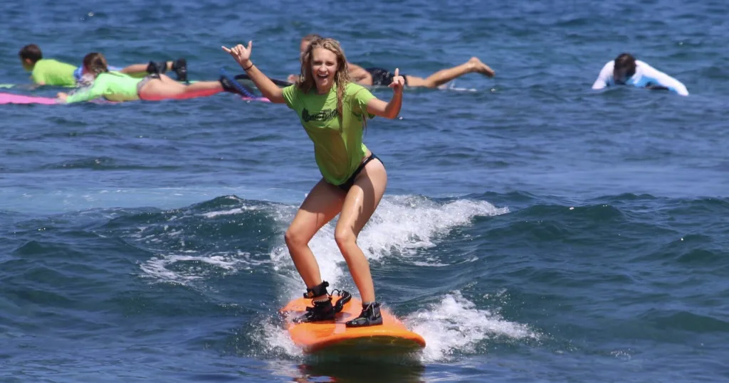 Individual receiving one-on-one private surf coaching