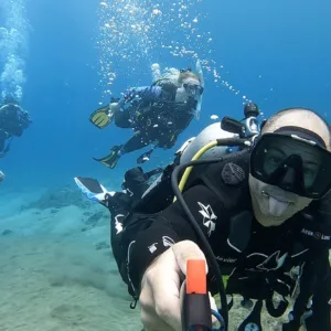 Open water scuba certification dive with instructor