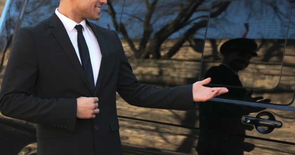 Transit van waiting outside airport terminal for pickup