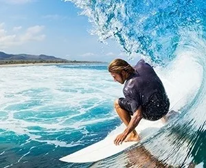 Instructor guiding students on stand up paddle boards