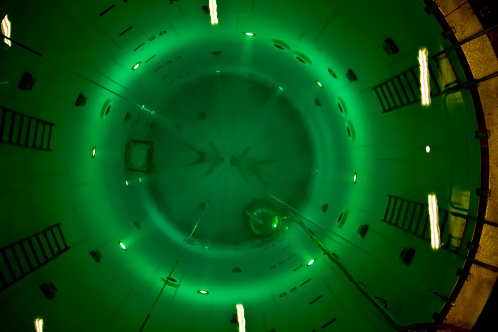 Instructor demonstrating breath-hold safety techniques in pool
