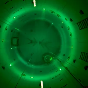 Instructor demonstrating breath-hold safety techniques in pool