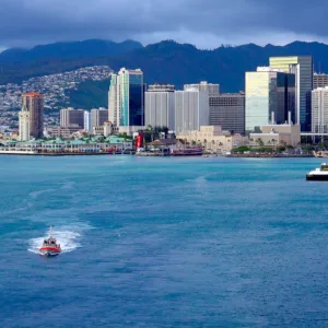 Passenger van parked outside Ko Olina hotel at sunset