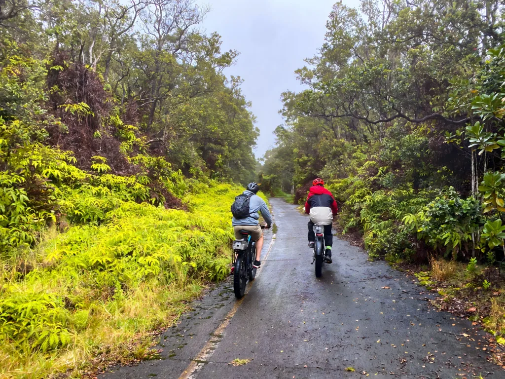 Group riding fat tire e-bikes near volcanic landscape