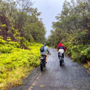 Group riding fat tire e-bikes near volcanic landscape
