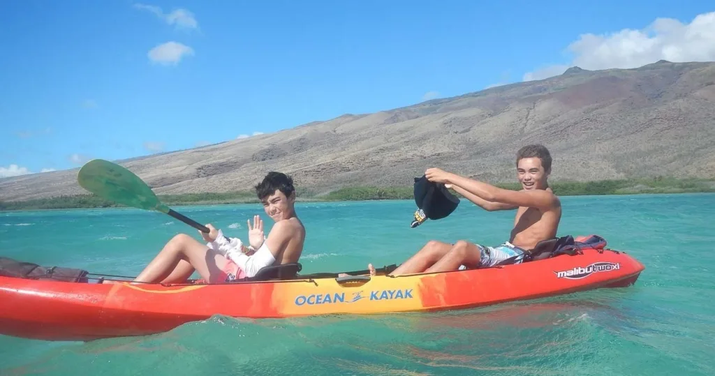 Kayakers and paddleboarders on a three mile downwind tour