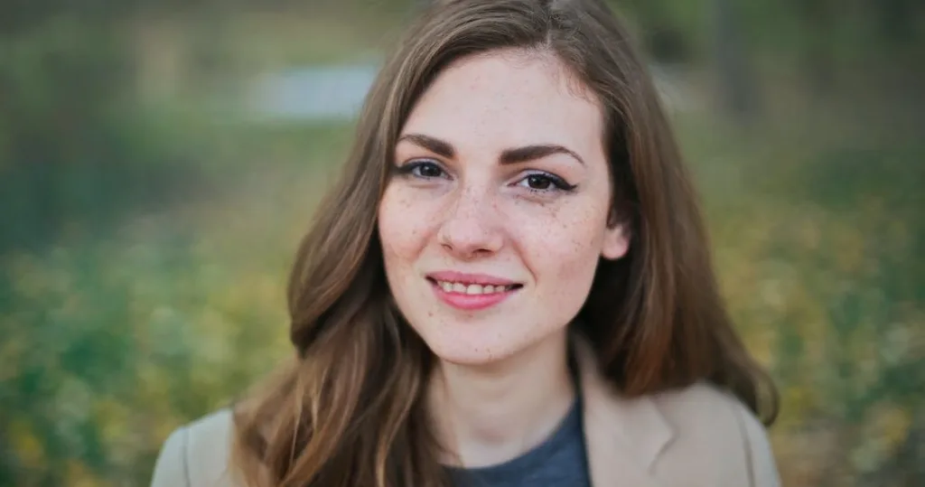 Smiling woman posing during a portrait photoshoot in Hawaii