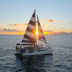 Sailing along Waikiki coast during a stunning sunset