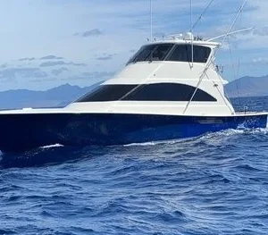 Luxury private boat charter cruising near tropical islands