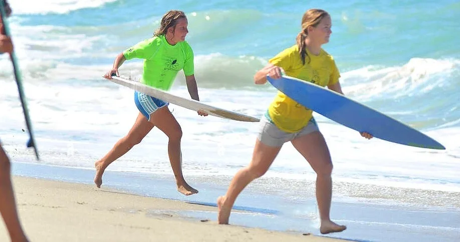 Semi-private skimboarding class with two participants