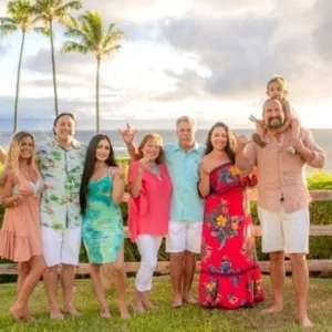 Extended family gathering for a group photo outdoors