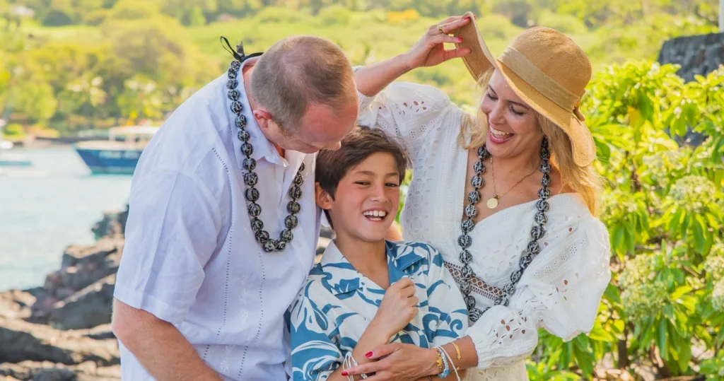 Couple enjoying a mini photo session at Outrigger Resort