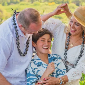 Couple enjoying a mini photo session at Outrigger Resort