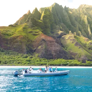 Afternoon boat tour exploring Nāpali Coast’s dramatic cliffs