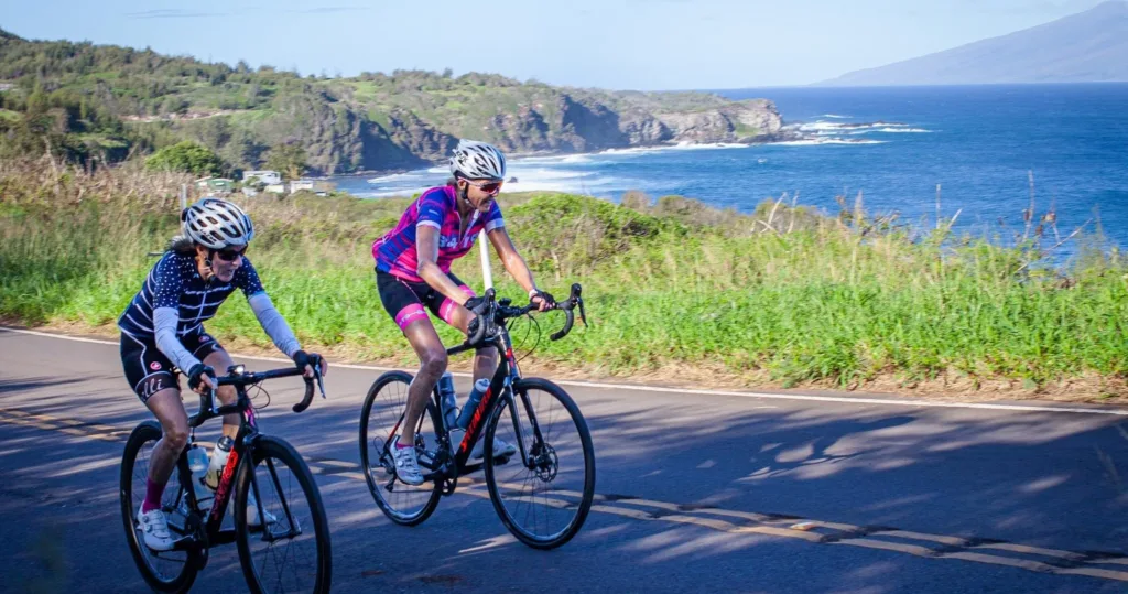 Cyclists enjoying a scenic road bike tour on Maui