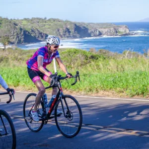 Cyclists enjoying a scenic road bike tour on Maui