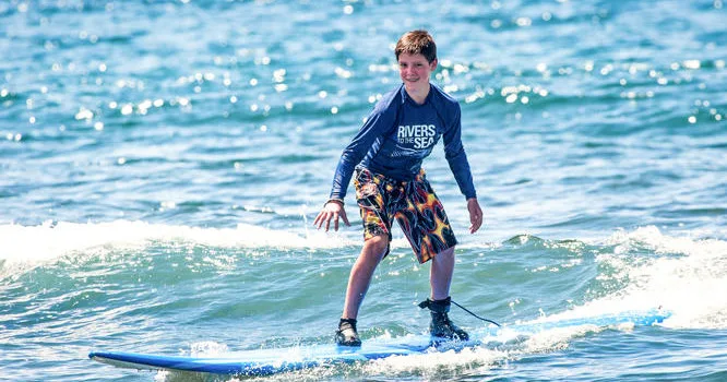 Private one-on-one surf lesson with instructor in ocean