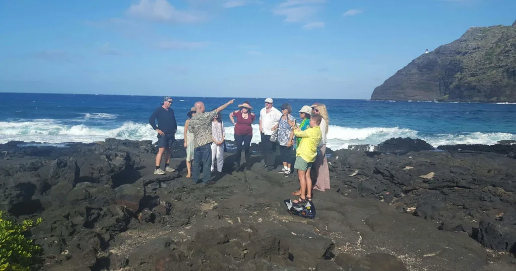 Small group visiting sacred sites on Oahu island tour