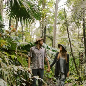 Visitors walking the Pantropical Trail through a dense cloud forest
