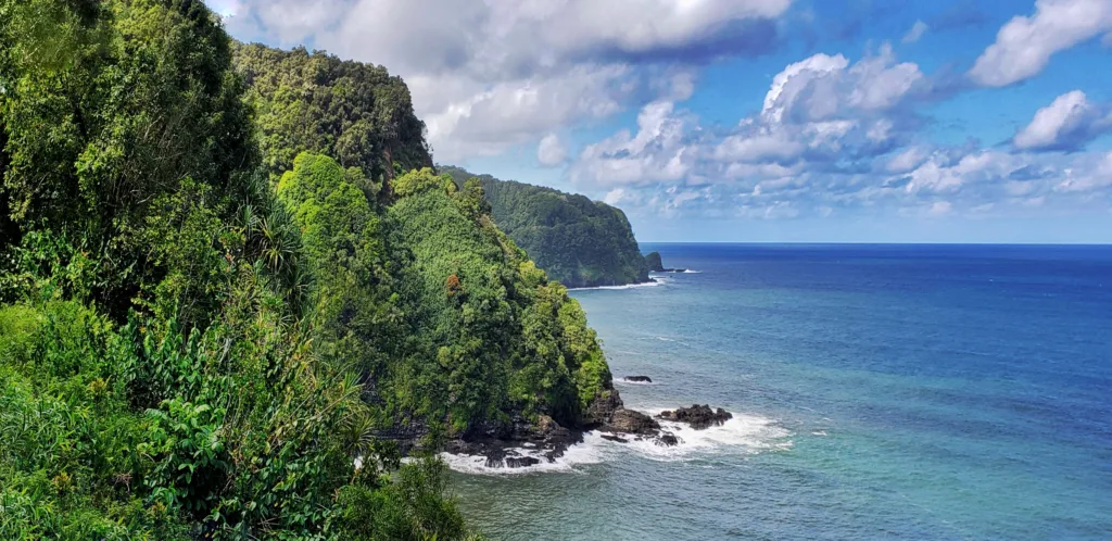 Hikers trekking the Hana Ali’i trail in Maui