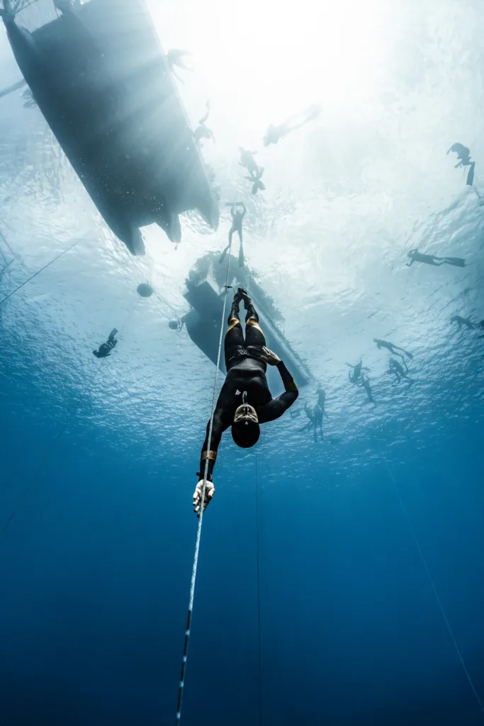 Instructor guiding private scuba diving training session