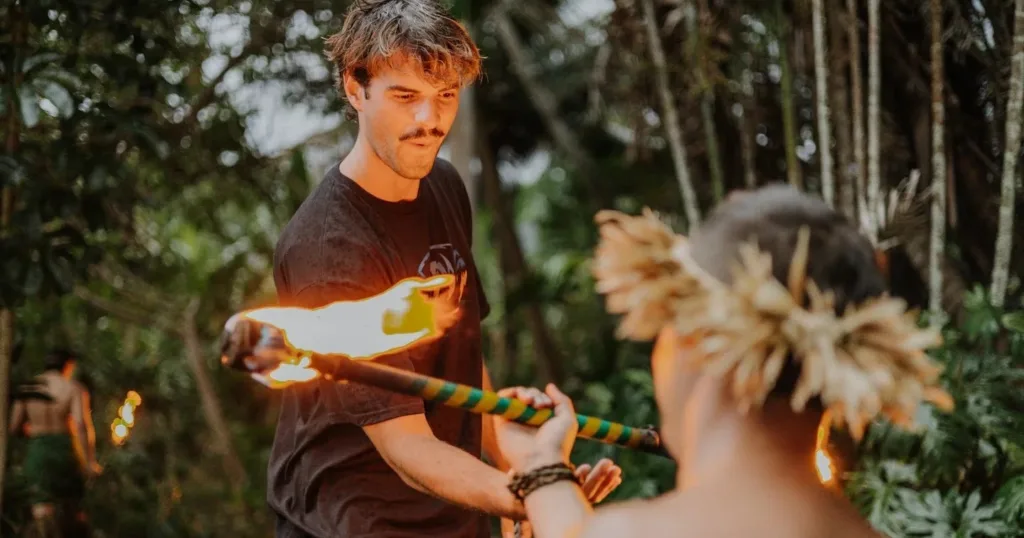 Participants learning fireknife skills during hands-on experience