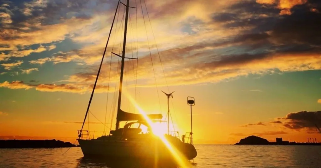 Vibrant sunset over the calm ocean horizon