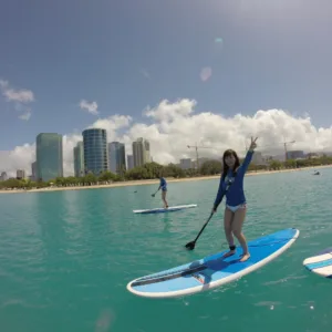 Instructor teaching stand up paddleboarding at Ala Moana beach