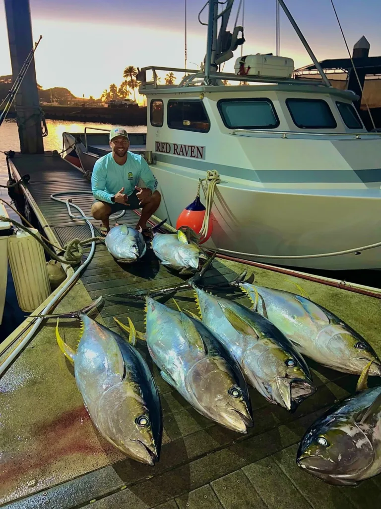 Fishermen casting lines on multi day deep sea trip
