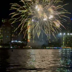 Boat cruise watching Waikiki fireworks at sunset