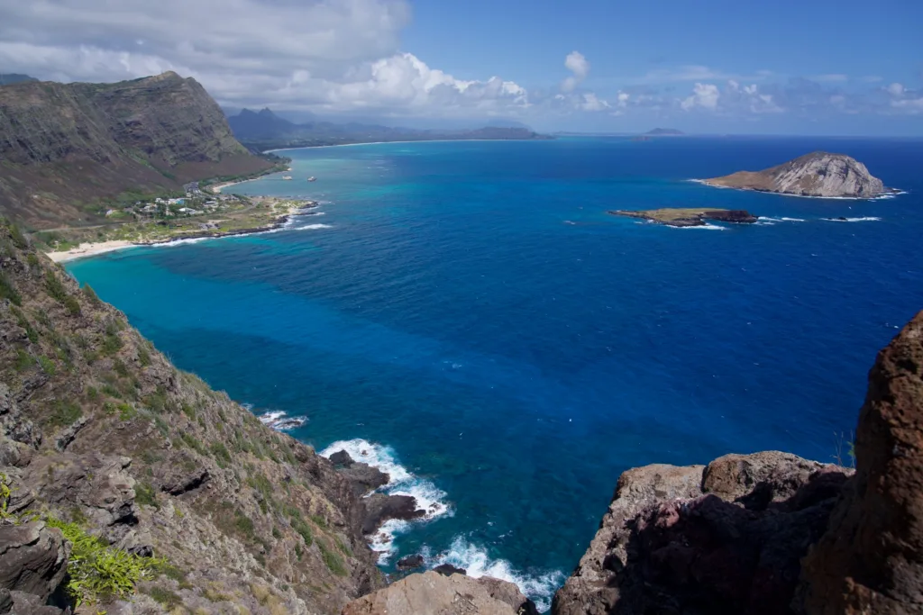 Private tour vehicle driving along Oahu’s scenic coast