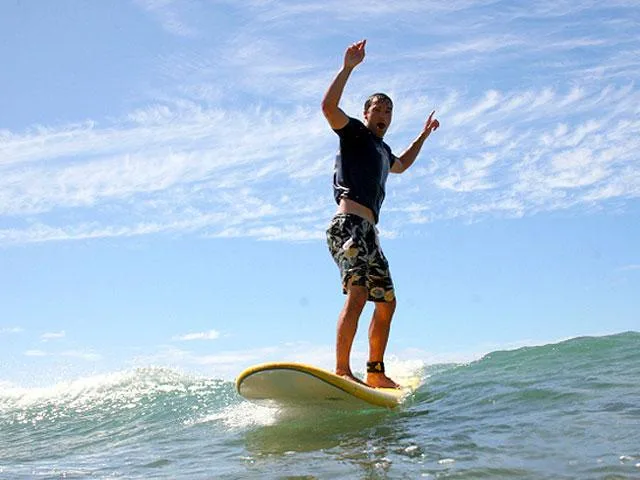 Beginner to advanced surf lessons on scenic island beaches