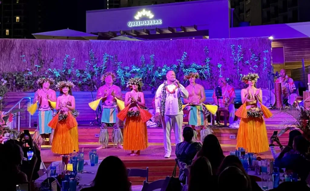 Traditional Hawaiian dancers performing at Paina Waikiki Luau