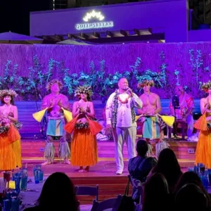 Traditional Hawaiian dancers performing at Paina Waikiki Luau