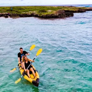 Kayakers navigating the serene waters near Popoia Island
