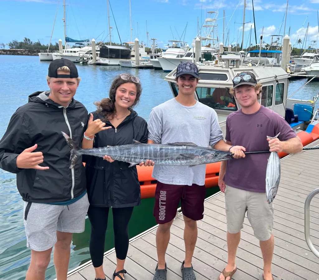 Fishing boat cruising through deep blue ocean waters