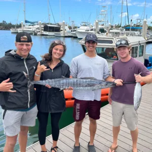 Fishing boat cruising through deep blue ocean waters