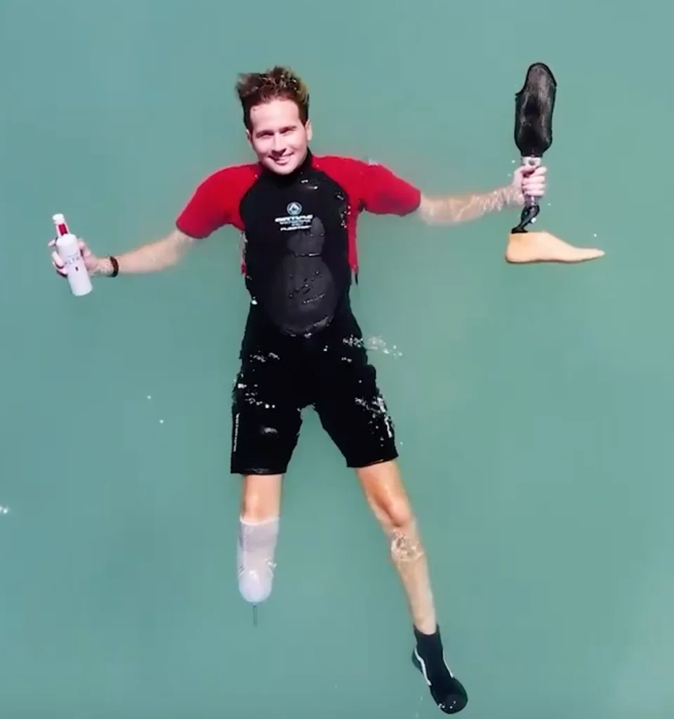 Beginners snorkeling with flotation wetsuits in calm waters