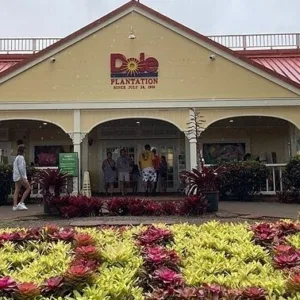 Luxury limousine parked at Dole Plantation entrance