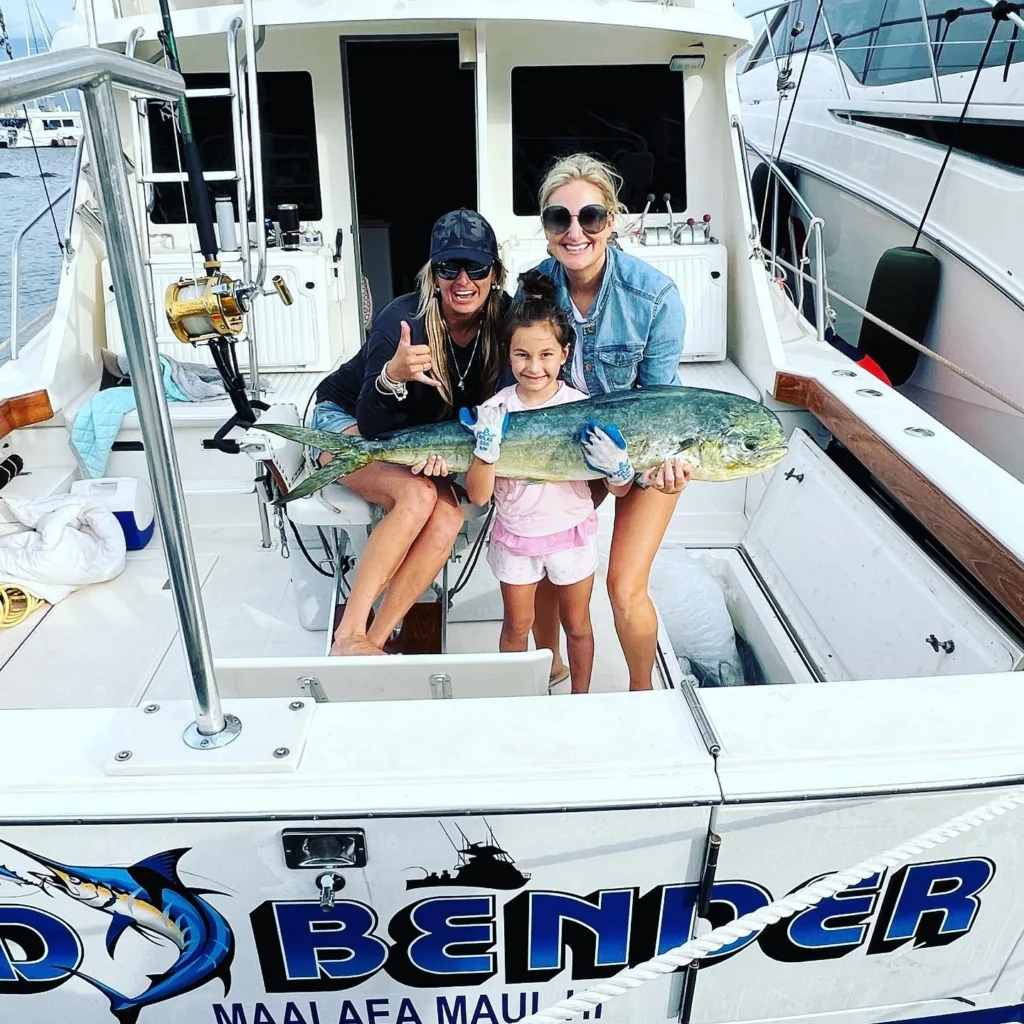Sport fishing boat anchored near Maui coastline