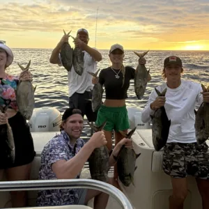 Private fishing boat cruising along island shores