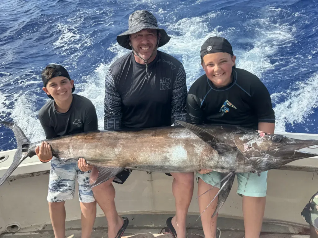 Fishing boat anchored offshore for half-day private fishing trip