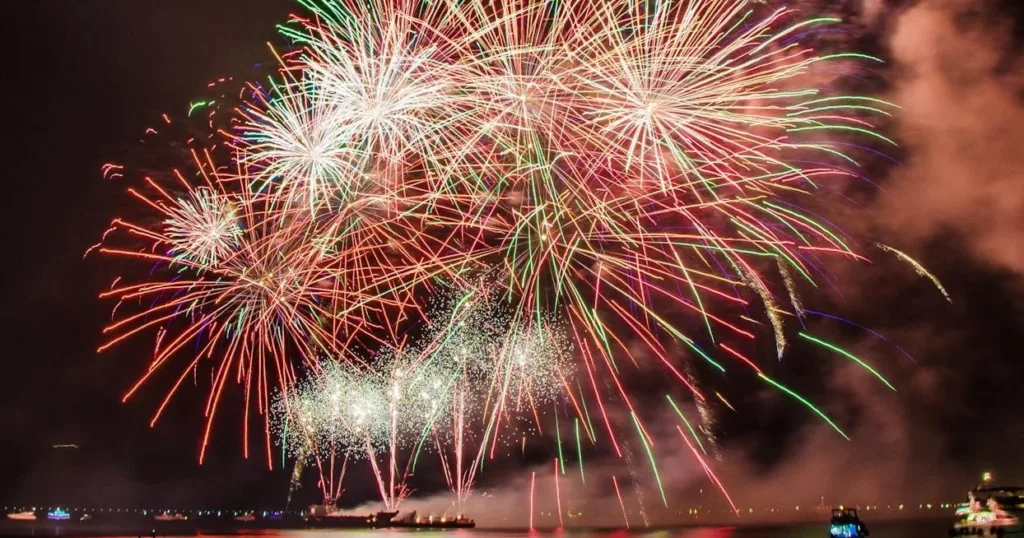 Public cruise enjoying sunset views and fireworks display