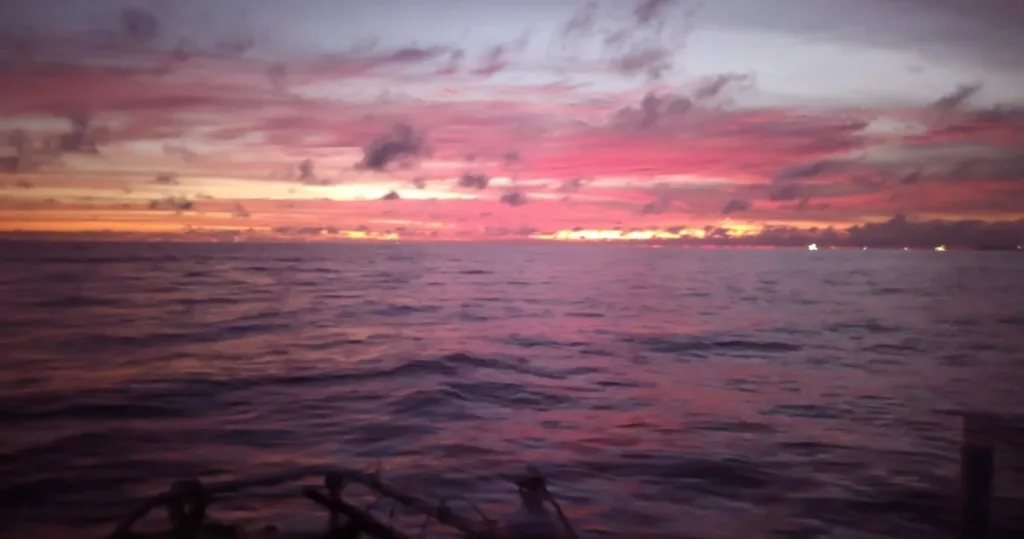 Couple enjoying a private sunset cruise in Waikiki