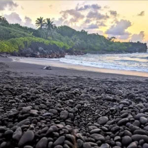 Jeep driving along scenic Hana backside coastline route