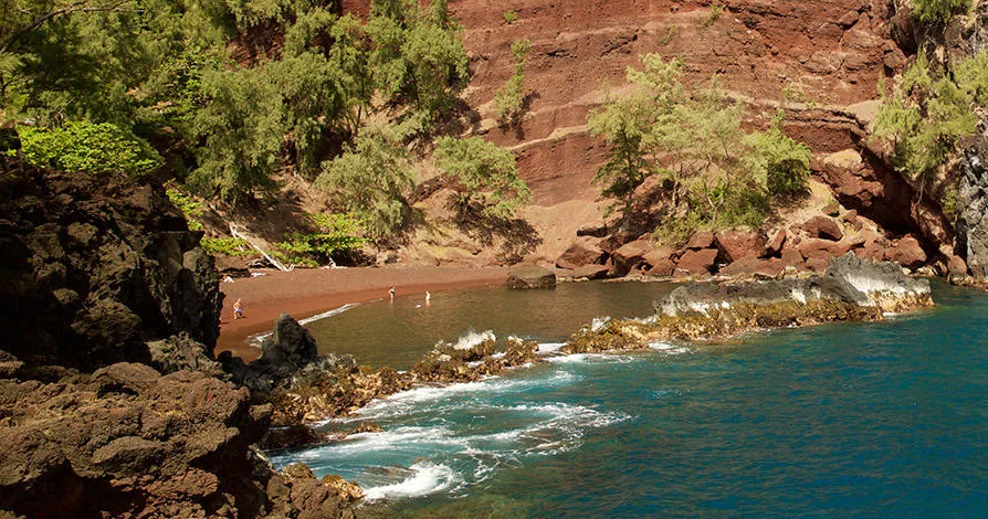 Travelers driving along scenic Road to Hana route