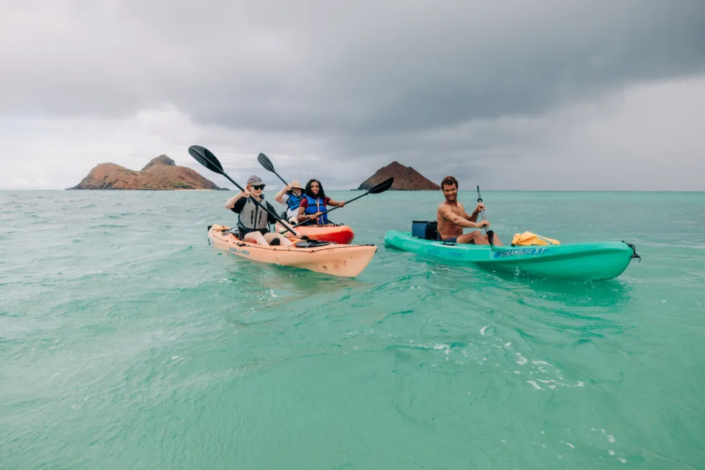 Kayakers paddling near Mokulua Islands in Kailua Bay