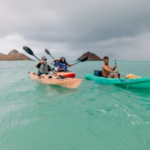 Kayakers paddling near Mokulua Islands in Kailua Bay