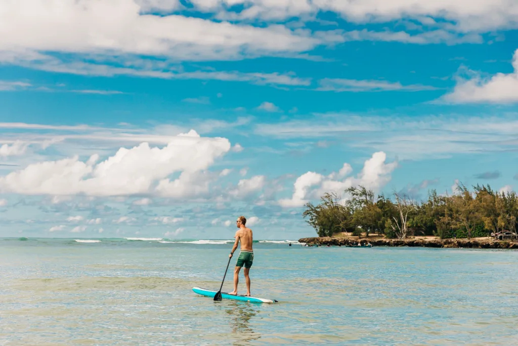 Paddleboard lesson taking place on calm Kailua Bay waters