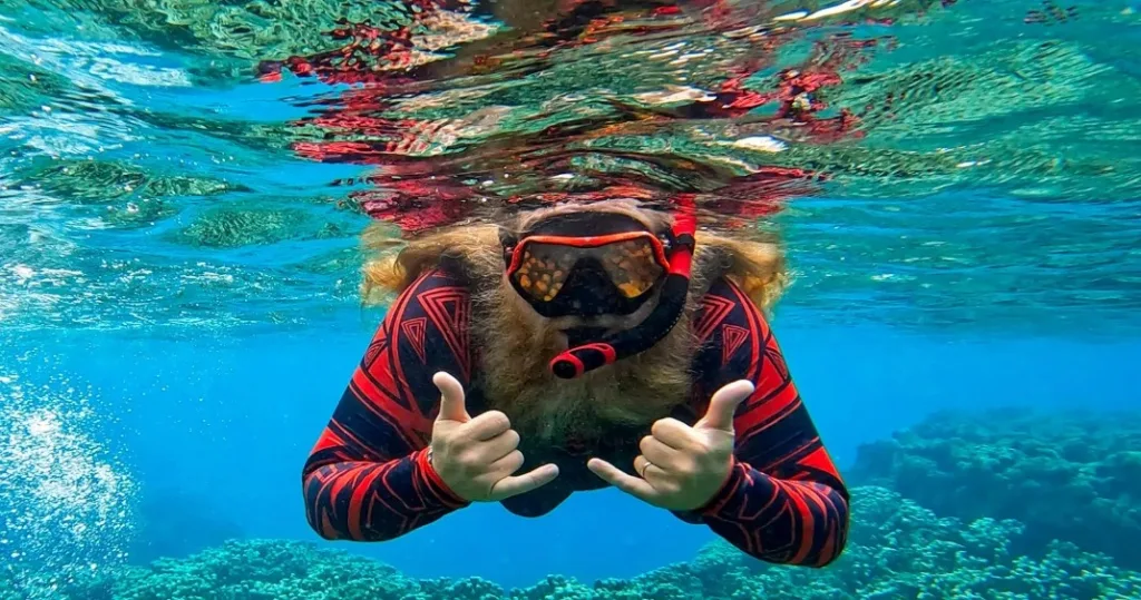 Guided snorkeling tour for beginners exploring colorful reefs